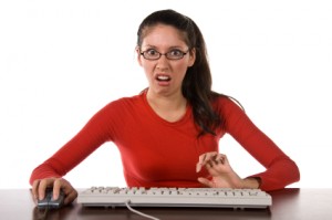 Scared woman on computer